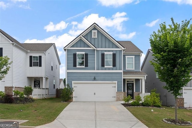 5755 Turnstone Trl, Flowery Branch, GA 30542 - craftsman inspired home featuring board and batten siding, concrete driveway, brick siding, an attached garage, and a front lawn