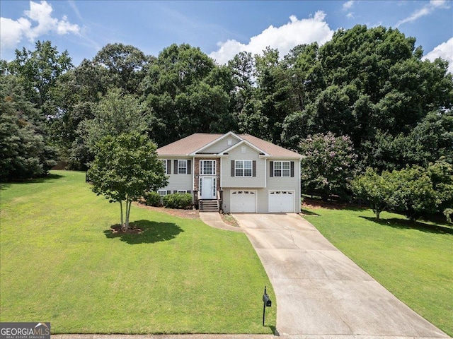 7825 Running Fox Trl, Gainesville, GA 30506 - split foyer home featuring a garage, concrete driveway, and a front yard