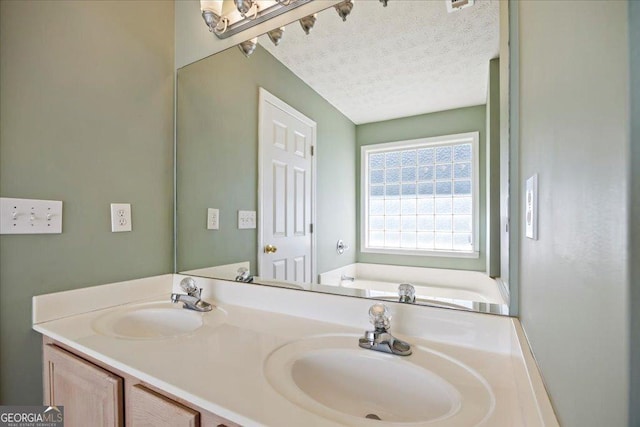 7825 Running Fox Trl, Gainesville, GA 30506 - full bathroom with double vanity, a garden tub, and a textured ceiling