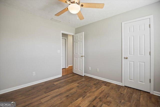 7825 Running Fox Trl, Gainesville, GA 30506 - unfurnished bedroom with wood finished floors and a ceiling fan