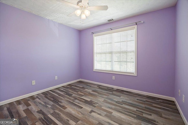 7825 Running Fox Trl, Gainesville, GA 30506 - spare room with a ceiling fan and wood finished floors