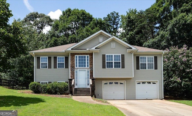 7825 Running Fox Trl, Gainesville, GA 30506 - raised ranch with a garage, driveway, and view of scattered trees