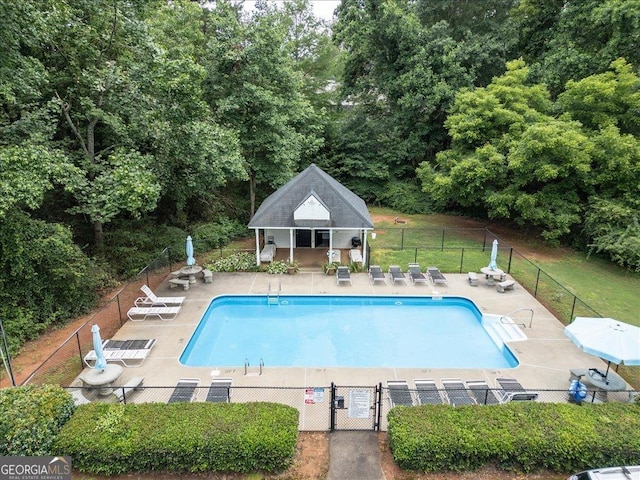 7825 Running Fox Trl, Gainesville, GA 30506 - community pool featuring a patio area and an outbuilding