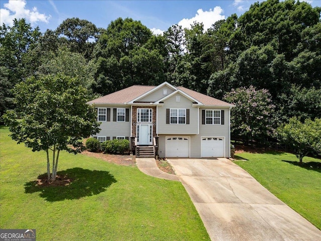 7825 Running Fox Trl, Gainesville, GA 30506 - split foyer home featuring concrete driveway, a garage, and a front yard