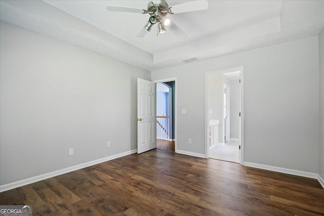 7825 Running Fox Trl, Gainesville, GA 30506 - spare room with a raised ceiling, wood finished floors, and ceiling fan