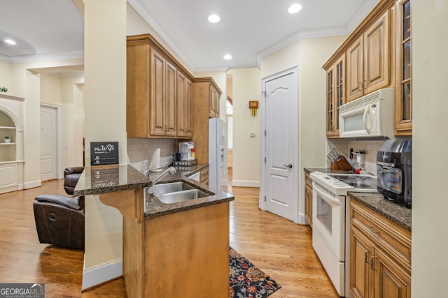 311 Vinings Walk, Gainesville, GA 30501 - kitchen with white appliances, crown molding, a breakfast bar, glass insert cabinets, and dark stone counters