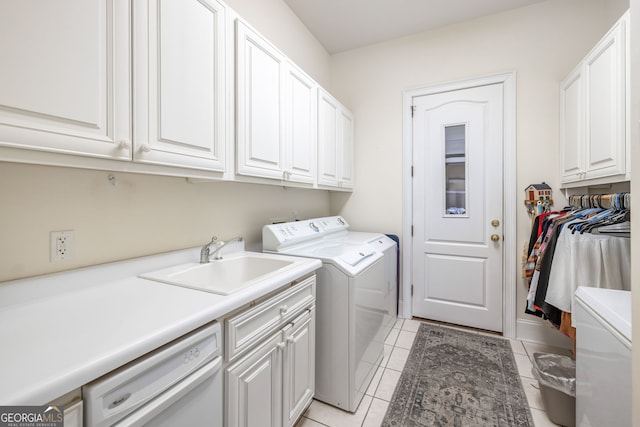 311 Vinings Walk, Gainesville, GA 30501 - laundry room featuring cabinet space, washing machine and clothes dryer, and light tile patterned floors