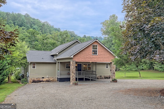 4505 Mccullum Trl, Hiawassee, GA 30546 - craftsman inspired home featuring crawl space, a porch, roof with shingles, and gravel driveway