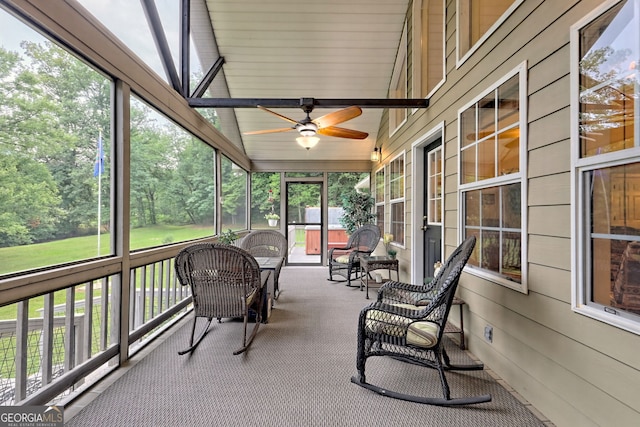 4505 Mccullum Trl, Hiawassee, GA 30546 - sunroom / solarium featuring a ceiling fan, healthy amount of natural light, and view of scattered trees