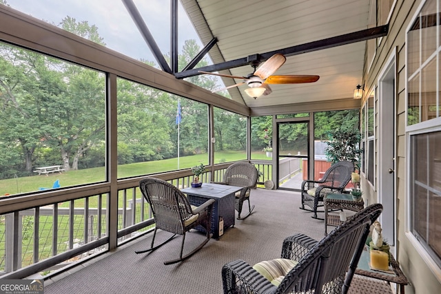 4505 Mccullum Trl, Hiawassee, GA 30546 - sunroom / solarium featuring a ceiling fan, vaulted ceiling, and view of scattered trees
