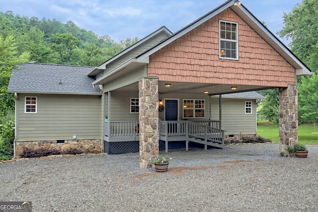 4505 Mccullum Trl, Hiawassee, GA 30546 - view of front facade featuring crawl space, a porch, and a shingled roof