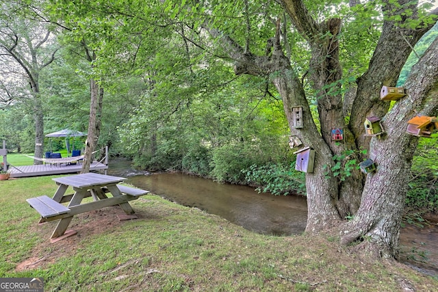 4505 Mccullum Trl, Hiawassee, GA 30546 - view of grassy yard featuring a deck