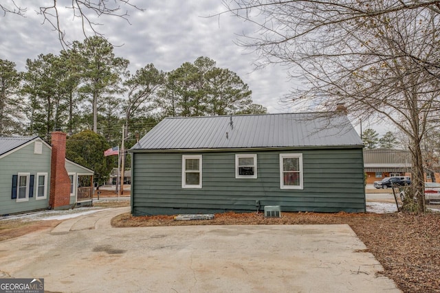 4131 Carroll St SW, Covington, GA 30014 - rear view of house featuring a metal roof