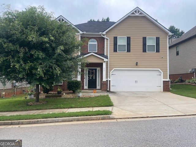 316 Sierra Ct, Mcdonough, GA 30253 - view of front facade featuring brick siding, an attached garage, concrete driveway, and a front lawn