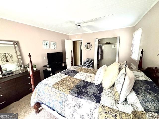 315 Clairborne Ave, Statesboro, GA 30458 - carpeted bedroom with a closet, crown molding, and a ceiling fan