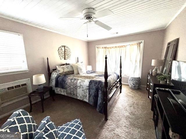 315 Clairborne Ave, Statesboro, GA 30458 - carpeted bedroom featuring ceiling fan, a wall mounted air conditioner, and wooden ceiling