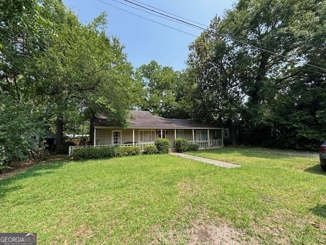 315 Clairborne Ave, Statesboro, GA 30458 - back of property with covered porch and a lawn