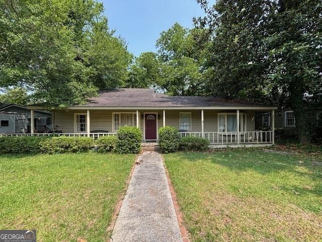 315 Clairborne Ave, Statesboro, GA 30458 - view of front of home featuring a porch and a front yard