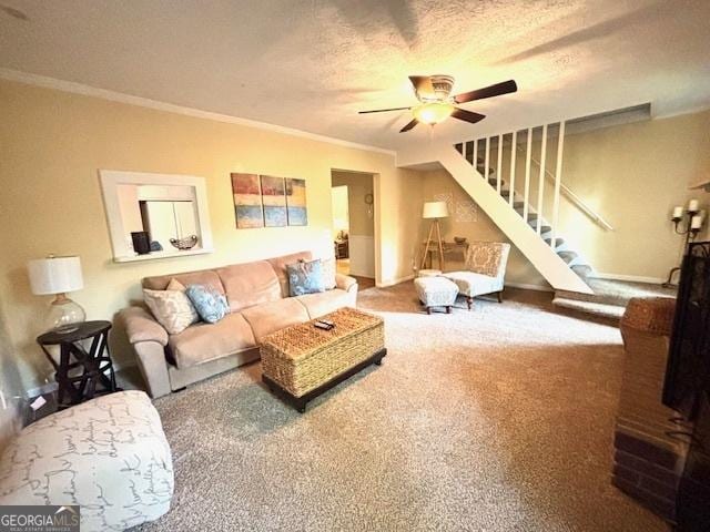 315 Clairborne Ave, Statesboro, GA 30458 - carpeted living area featuring a ceiling fan, ornamental molding, and stairs
