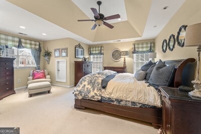 154 Hunters Trl, Dallas, GA 30157 - carpeted bedroom with a tray ceiling and recessed lighting