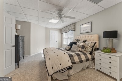 154 Hunters Trl, Dallas, GA 30157 - bedroom featuring light colored carpet, a drop ceiling, and ceiling fan