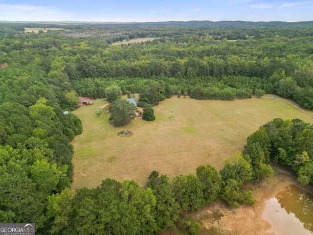 223 Arthur Rd, Zebulon, GA 30295 - drone / aerial view of a heavily wooded area and a large body of water