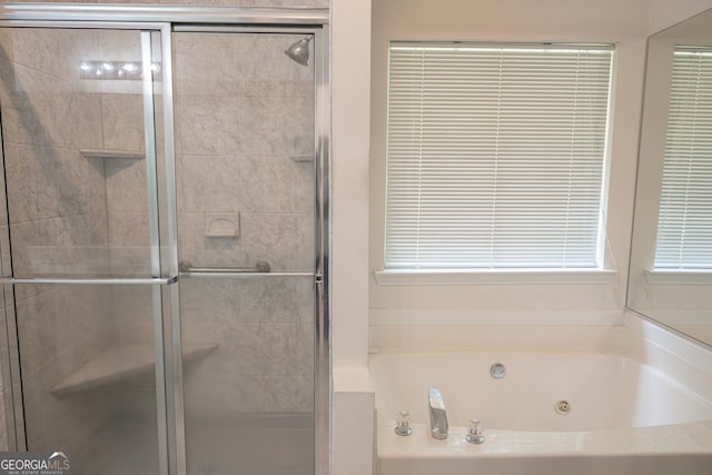 2407 Cove Lake Way, Lithonia, GA 30058 - full bath featuring a jetted tub, a stall shower, and plenty of natural light