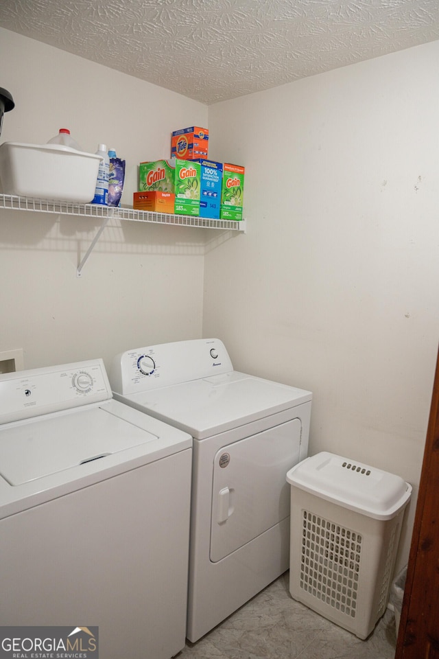2407 Cove Lake Way, Lithonia, GA 30058 - washroom featuring separate washer and dryer and a textured ceiling