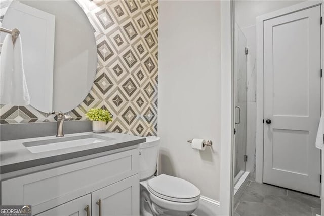 2493 Oostanaula Dr, Brookhaven, GA 30319 - full bathroom featuring vanity, a shower stall, toilet, and baseboards