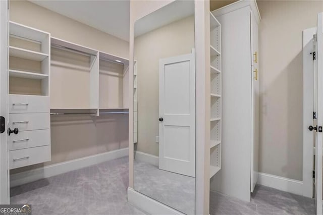 2493 Oostanaula Dr, Brookhaven, GA 30319 - walk in closet featuring carpet floors