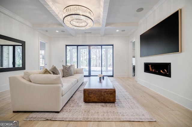 5050 Browns Ford Rd, Greensboro, GA 30642 - living area with coffered ceiling, wood finished floors, plenty of natural light, a chandelier, and beamed ceiling