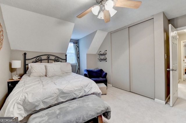 3694 Jay Bird Aly, Peachtree Corners, GA 30092 - bedroom featuring light colored carpet, a closet, lofted ceiling, and a ceiling fan