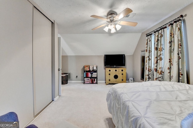 3694 Jay Bird Aly, Peachtree Corners, GA 30092 - bedroom with vaulted ceiling, light carpet, baseboards, ceiling fan, and a textured ceiling