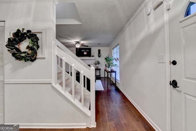 3694 Jay Bird Aly, Peachtree Corners, GA 30092 - foyer featuring stairway, dark wood finished floors, a textured ceiling, ceiling fan, and baseboards