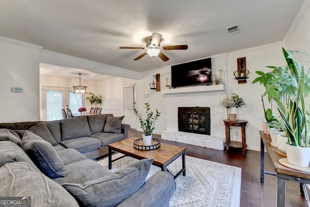 3694 Jay Bird Aly, Peachtree Corners, GA 30092 - living room featuring a ceiling fan, a fireplace, wood finished floors, and ornamental molding