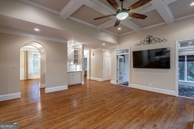 1984 Mendenhall Cir, Atlanta, GA 30341 - unfurnished living room featuring ceiling fan, coffered ceiling, beamed ceiling, wood finished floors, and healthy amount of natural light
