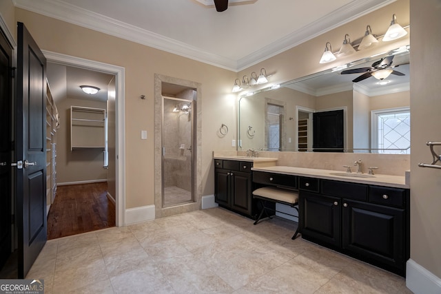 1984 Mendenhall Cir, Atlanta, GA 30341 - full bath featuring ceiling fan, double vanity, a shower stall, crown molding, and a walk in closet