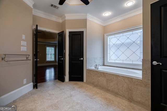 1984 Mendenhall Cir, Atlanta, GA 30341 - bathroom featuring a bath, ceiling fan, ornamental molding, and tile patterned flooring