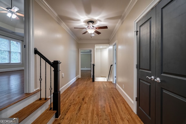 1984 Mendenhall Cir, Atlanta, GA 30341 - corridor with light wood-style flooring, ornamental molding, and an upstairs landing