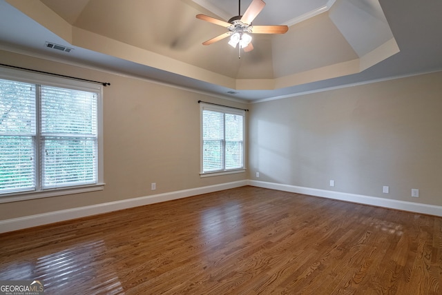 1984 Mendenhall Cir, Atlanta, GA 30341 - unfurnished room with a raised ceiling, a ceiling fan, wood finished floors, and crown molding