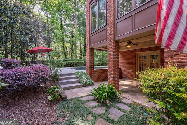1984 Mendenhall Cir, Atlanta, GA 30341 - view of yard featuring ceiling fan, a pool, and a patio