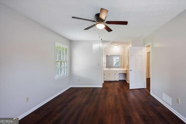 3802 Birchbriar Ct, Decatur, GA 30034 - unfurnished bedroom featuring dark wood-type flooring, baseboards, and ensuite bathroom