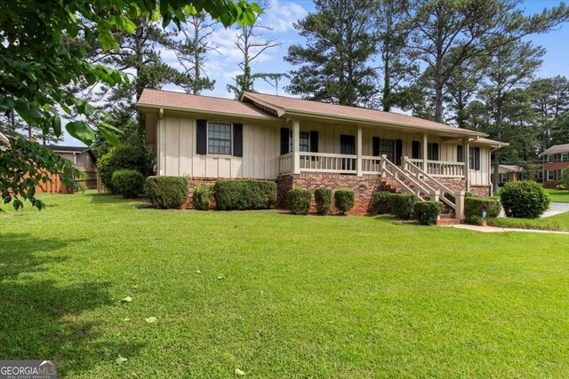 3802 Birchbriar Ct, Decatur, GA 30034 - ranch-style house featuring board and batten siding, a porch, and stairs