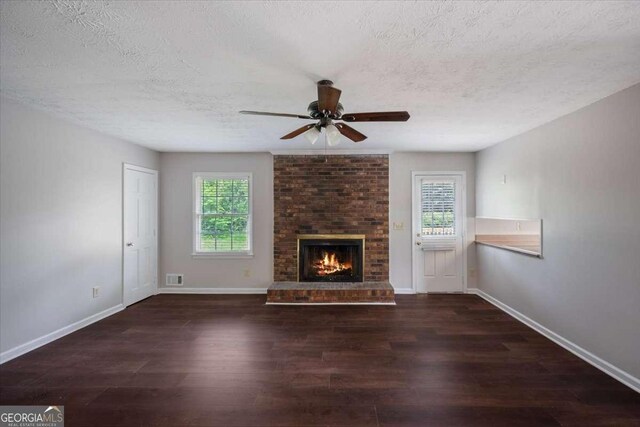 3802 Birchbriar Ct, Decatur, GA 30034 - unfurnished living room with a textured ceiling, a ceiling fan, wood finished floors, and healthy amount of natural light