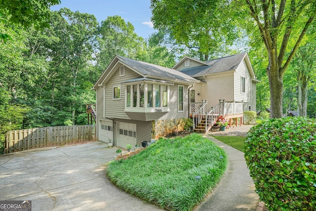 2666 Peachtree Walk, Duluth, GA 30096 - view of front of property featuring concrete driveway, an attached garage, and a shingled roof