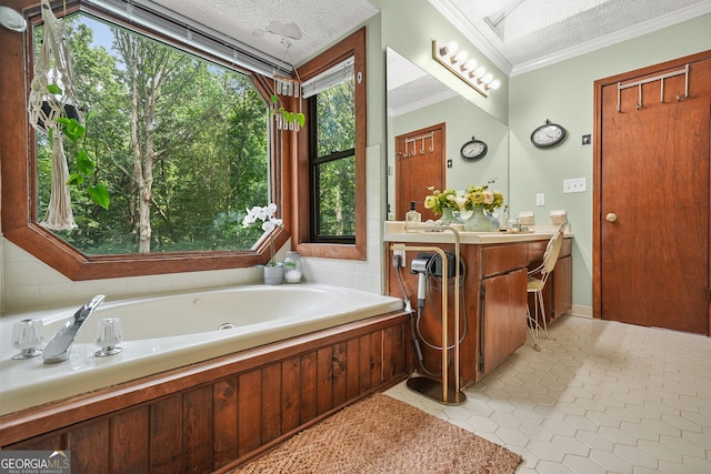 2666 Peachtree Walk, Duluth, GA 30096 - bathroom featuring double vanity, tile patterned flooring, a tub with jets, crown molding, and a textured ceiling