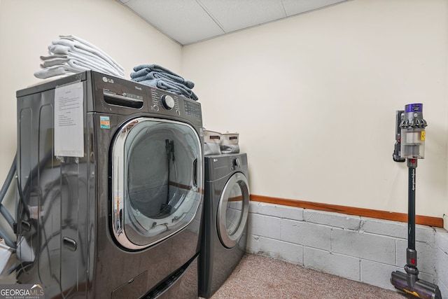 2666 Peachtree Walk, Duluth, GA 30096 - laundry room featuring independent washer and dryer, concrete block wall, and carpet flooring