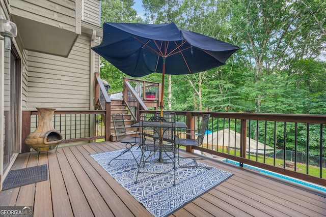 2666 Peachtree Walk, Duluth, GA 30096 - wooden terrace featuring stairs and outdoor dining space