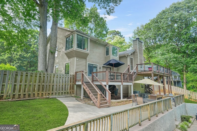 2666 Peachtree Walk, Duluth, GA 30096 - rear view of property with stairway, a deck, a patio, and a chimney