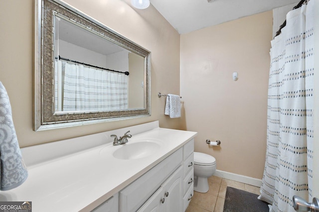 207 Saddle Mountain Rd SE, Rome, GA 30161 - full bath featuring vanity, toilet, tile patterned flooring, baseboards, and a shower with curtain